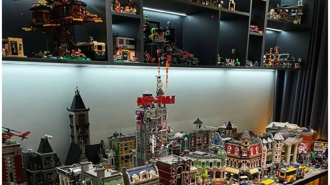 LEGO display room with lit shelves and a large brick city setup