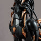 Close-up of black and copper-gold body details on the Xiezhi model