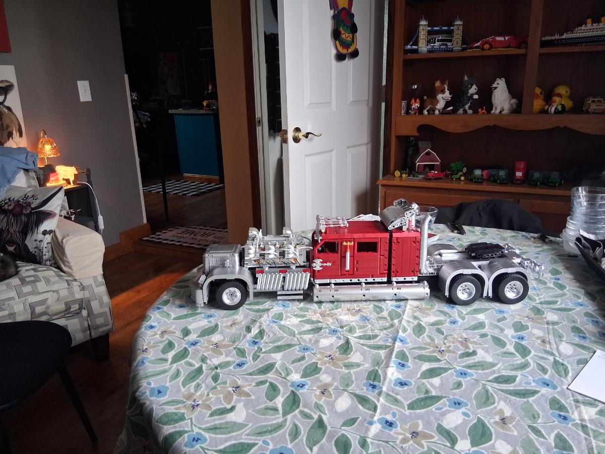 Buyer-submitted red and silver Heavy Truck Car building-block model on a table